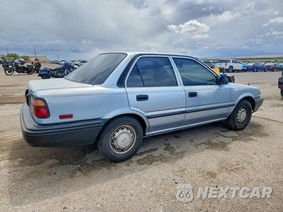 Trzecie zdjęcie samochodu z tyłu: 1990 TOYOTA COROLLA DLX VIN:1NXAE94A6LZ086839 - miniatura