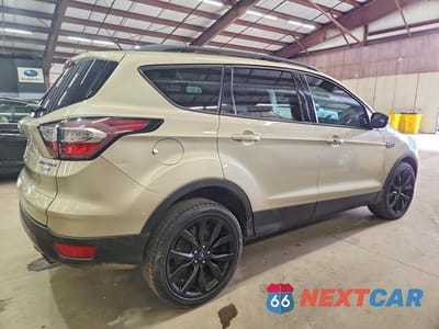 Trzecie zdjęcie samochodu z tyłu: 2017 FORD ESCAPE TITANIUM VIN:1FMCU0JD4HUC04836 - miniatura