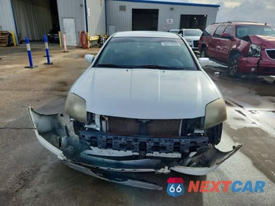Piąte zdjęcie samochodu w środku: 2012 MITSUBISHI GALANT ES VIN:4A32B3FF8CE010652 - miniatura