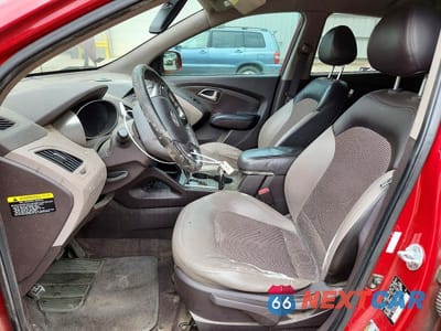 Zdjęcie 7 z 14 samochodu: 2011 HYUNDAI TUCSON GLS VIN:KM8JU3ACXBU120561 - miniatura