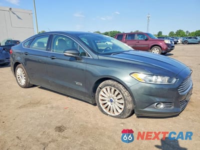 Czwarte zdjęcie samochodu z boku: 2016 FORD FUSION SE PHEV VIN:3FA6P0PU1GR191300 - miniatura