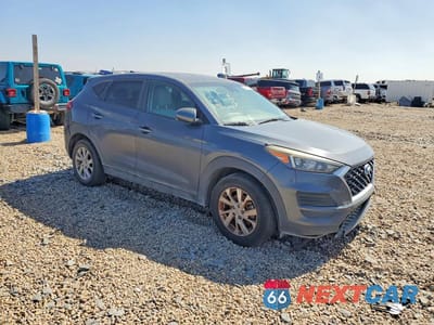 Czwarte zdjęcie samochodu z boku: 2019 HYUNDAI TUCSON SE VIN:KM8J2CA4XKU882397 - miniatura