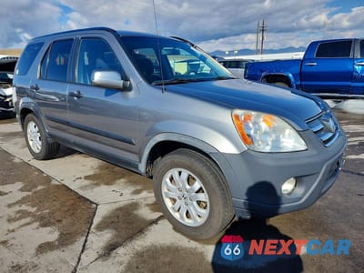 Czwarte zdjęcie samochodu z boku: 2006 HONDA CR-V EX VIN:JHLRD78886C030467 - miniatura