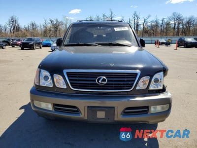 Piąte zdjęcie samochodu w środku: 2002 LEXUS LX 470 VIN:JTJHT00W323519525 - miniatura