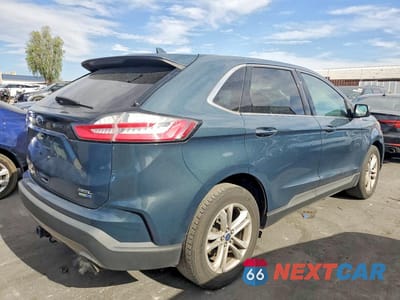 Trzecie zdjęcie samochodu z tyłu: 2019 FORD EDGE SEL VIN:2FMPK4J92KBC38331 - miniatura