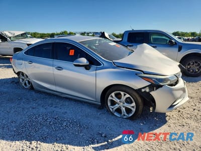 Czwarte zdjęcie samochodu z boku: 2017 CHEVROLET CRUZE PREMIER VIN:1G1BF5SM6H7244400 - miniatura