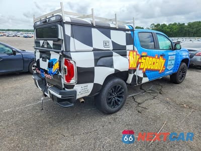 Trzecie zdjęcie samochodu z tyłu: 2021 GMC CANYON ELEVATION VIN:1GTG5BEN6M1203975 - miniatura