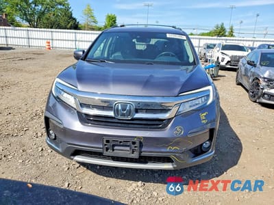 Piąte zdjęcie samochodu w środku: 2022 HONDA PILOT ELITE VIN:5FNYF6H00NB014160 - miniatura