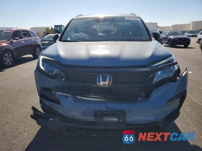 Piąte zdjęcie samochodu w środku: 2022 HONDA PILOT TRAILSPORT VIN:5FNYF6H85NB084517 - miniatura