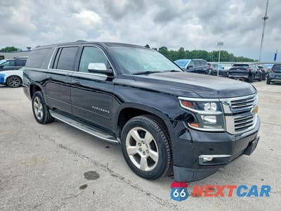 Czwarte zdjęcie samochodu z boku: 2015 CHEVROLET SUBURBAN K1500 LTZ VIN:1GNSKKKC8FR147653 - miniatura