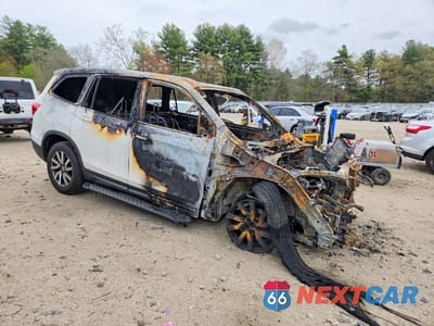 Czwarte zdjęcie samochodu z boku: 2021 HONDA PILOT EXL VIN:5FNYF6H5XMB054126 - miniatura