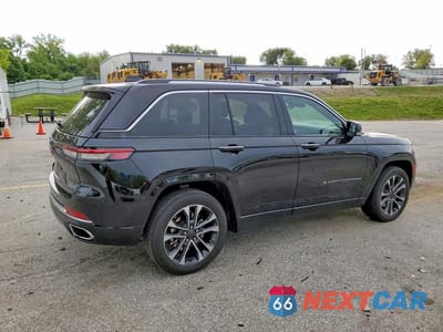 Trzecie zdjęcie samochodu z tyłu: 2023 JEEP GRAND CHEROKEE OVERLAND 4XE VIN:1C4RJYD64P8787466 - miniatura