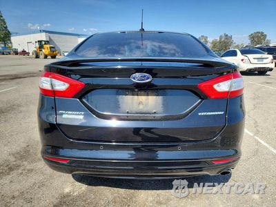 Zdjęcie 6 z 13 samochodu: 2016 FORD FUSION TITANIUM PHEV VIN:3FA6P0SU1GR229566 - miniatura