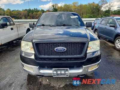 Piąte zdjęcie samochodu w środku: 2004 FORD F150 VIN:1FTPX14504NB67053 - miniatura