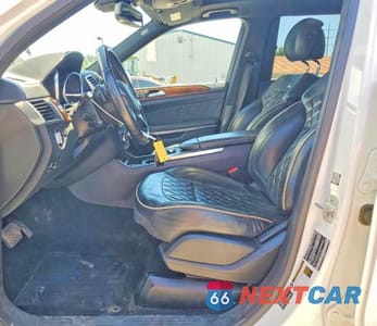 Zdjęcie 7 z 13 samochodu: 2014 MERCEDES-BENZ GL 450 4MATIC VIN:4JGDF7CEXEA399626 - miniatura