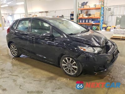 Czwarte zdjęcie samochodu z boku: 2017 HONDA FIT EX VIN:3HGGK5G70HM701513 - miniatura