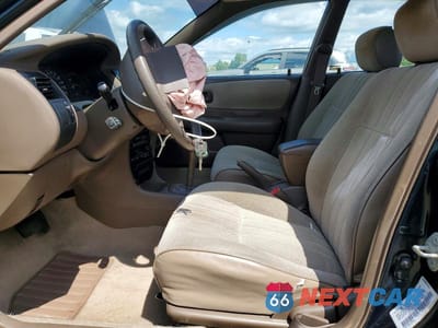 Zdjęcie 7 z 13 samochodu: 1997 TOYOTA COROLLA BASE VIN:1NXBA02EXVZ634619 - miniatura