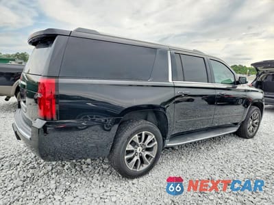 Trzecie zdjęcie samochodu z tyłu: 2017 CHEVROLET SUBURBAN C1500 PREMIER VIN:1GNSCJKC0HR213803 - miniatura