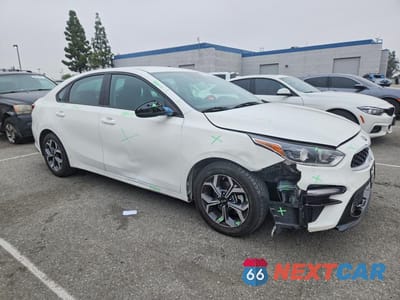 Czwarte zdjęcie samochodu z boku: 2021 KIA FORTE LXS VIN:3KPF24AD2ME294527 - miniatura