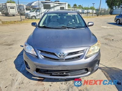 Piąte zdjęcie samochodu w środku: 2012 TOYOTA COROLLA LE VIN:JTDBU4EE4C9175280 - miniatura