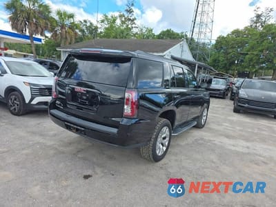 Czwarte zdjęcie samochodu z boku: 2016 GMC YUKON SLT VIN:1GKS2BKC7GR481011 - miniatura
