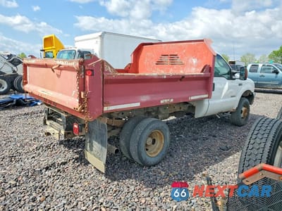 Trzecie zdjęcie samochodu z tyłu: 2003 FORD F350 SUPER DUTY DUMP TRUCK VIN:1FDWF37P83ED28525 - miniatura