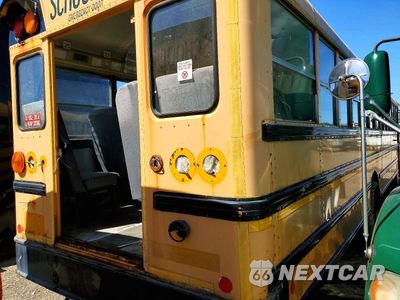 Czwarte zdjęcie samochodu z boku: 2010 IC CORPORATION CE SERIES SCHOOL - SCHOOL BUS VIN:4DRBUAAP3AB142309 - miniatura