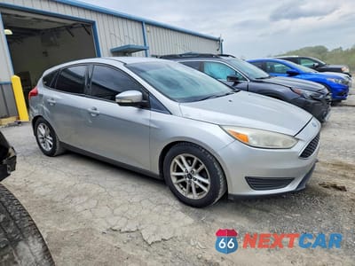 Czwarte zdjęcie samochodu z boku: 2016 FORD FOCUS SE VIN:1FADP3K24GL242222 - miniatura