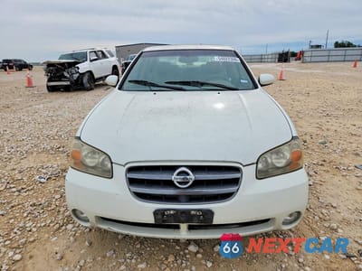 Piąte zdjęcie samochodu w środku: 2003 NISSAN MAXIMA GXE VIN:JN1DA31A13T439768 - miniatura