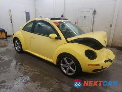 Czwarte zdjęcie samochodu z boku: 2009 VOLKSWAGEN NEW BEETLE S VIN:3VWRW31C19M511417 - miniatura