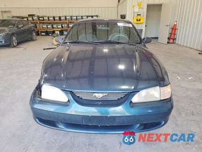 Piąte zdjęcie samochodu w środku: 1994 FORD MUSTANG VIN:1FALP4049RF123119 - miniatura
