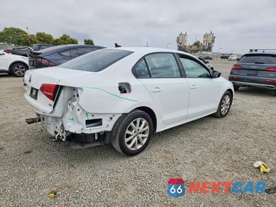Trzecie zdjęcie samochodu z tyłu: 2015 VOLKSWAGEN JETTA SE VIN:3VWD17AJ6FM418712 - miniatura