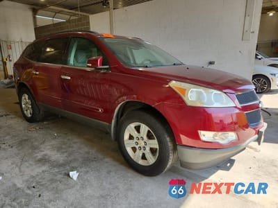 Czwarte zdjęcie samochodu z boku: 2010 CHEVROLET TRAVERSE LT VIN:1GNLRFED3AS143250 - miniatura