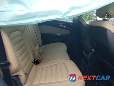 Zdjęcie 11 z 13 samochodu: 2015 FORD EDGE SEL VIN:2FMTK3J86FBB37606 - miniatura