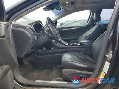 Zdjęcie 7 z 13 samochodu: 2013 FORD FUSION TITANIUM PHEV VIN:3FA6P0SU8DR365799 - miniatura