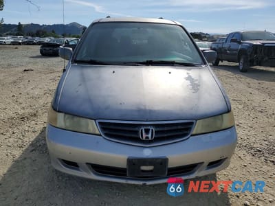 Piąte zdjęcie samochodu w środku: 2002 HONDA ODYSSEY EX VIN:2HKRL186X2H511962 - miniatura