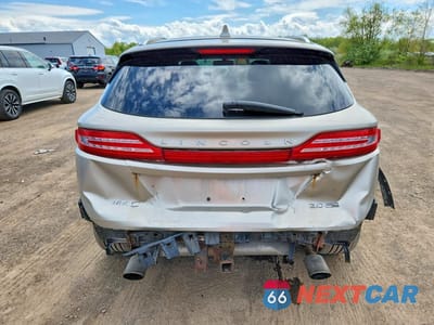 Zdjęcie 6 z 13 samochodu: 2015 LINCOLN MKC VIN:5LMCJ2A94FUJ27718 - miniatura
