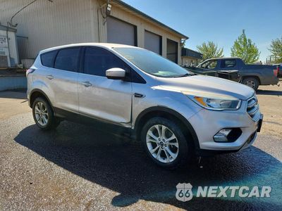 Czwarte zdjęcie samochodu z boku: 2017 FORD ESCAPE SE VIN:1FMCU9GD2HUC38821 - miniatura