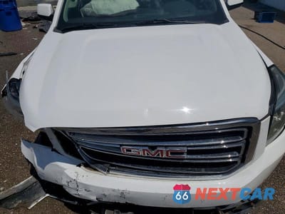 Zdjęcie 12 z 14 samochodu: 2018 GMC YUKON SLT VIN:1GKS2BKC4JR359729 - miniatura