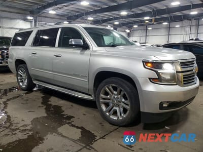 Czwarte zdjęcie samochodu z boku: 2016 CHEVROLET SUBURBAN K1500 LTZ VIN:1GNSKJKC9GR117492 - miniatura