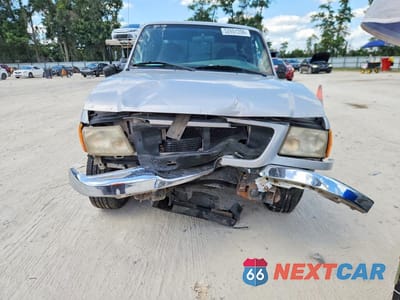 Piąte zdjęcie samochodu w środku: 2001 FORD RANGER SUPER CAB VIN:1FTYR14E21TA23056 - miniatura