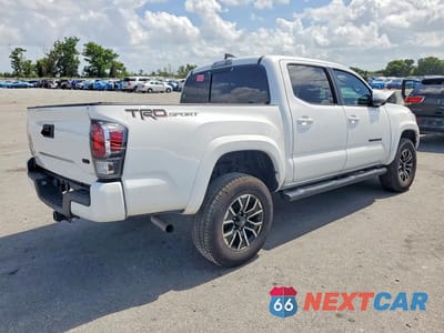 Trzecie zdjęcie samochodu z tyłu: 2023 TOYOTA TACOMA TRD SPORT VIN:3TMAZ5CNXPM207940 - miniatura