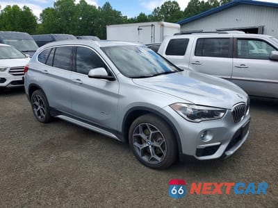 Czwarte zdjęcie samochodu z boku: 2016 BMW X1 XDRIVE28I VIN:WBXHT3C31GP886321 - miniatura