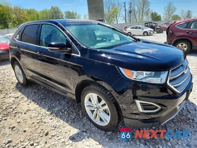Czwarte zdjęcie samochodu z boku: 2017 FORD EDGE SEL VIN:2FMPK3J97HBB00111 - miniatura