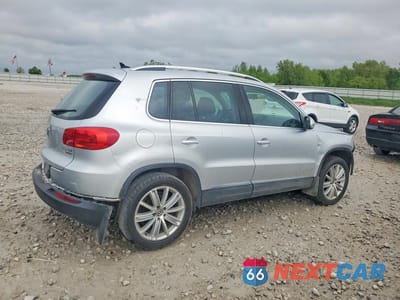 Trzecie zdjęcie samochodu z tyłu: 2014 VOLKSWAGEN TIGUAN S VIN:WVGBV3AX0EW580132 - miniatura