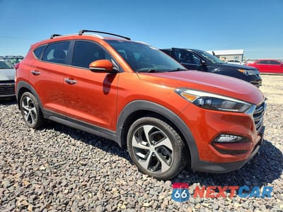 Czwarte zdjęcie samochodu z boku: 2016 HYUNDAI TUCSON LIMITED VIN:KM8J33A24GU074825 - miniatura