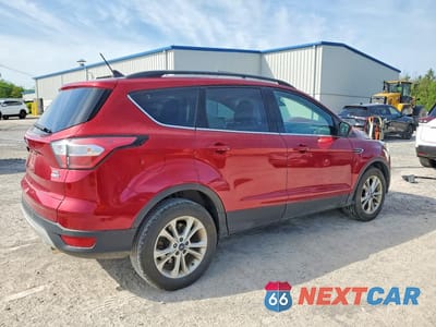 Trzecie zdjęcie samochodu z tyłu: 2018 FORD ESCAPE SEL VIN:1FMCU9HDXJUA95573 - miniatura