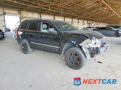 Czwarte zdjęcie samochodu z boku: 2006 JEEP GRAND CHEROKEE OVERLAND VIN:1J8HS68286C251774 - miniatura