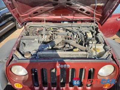 Zdjęcie 11 z 12 samochodu: 2010 JEEP WRANGLER SPORT VIN:1J4AA2D14AL155189 - miniatura