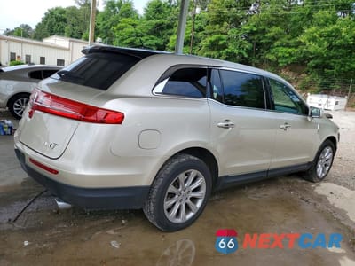 Trzecie zdjęcie samochodu z tyłu: 2017 LINCOLN MKT VIN:2LMHJ5FK1HBL00680 - miniatura
